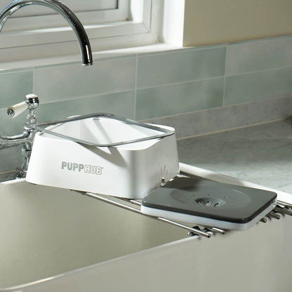 The removable zero-splash bowl is placed next to the sink